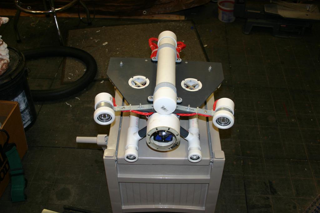 Wide angle of the front. During our first water test. The ROV was negative buoyant, and we needed to add the 2" upper buoyancy tube. This proved to be a good addition, along with the balast in the two skids.... This allowed us to move the CG (center of gravity) below the main electronics tube, making it very stable. You can place the ROV in any position underwater and it rights it's self.
